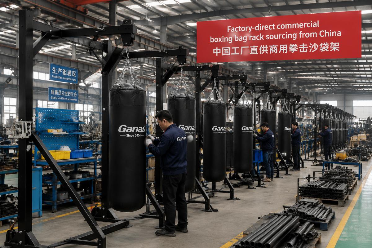Factory production line for commercial boxing bag racks at a Chinese fitness equipment manufacturing facility