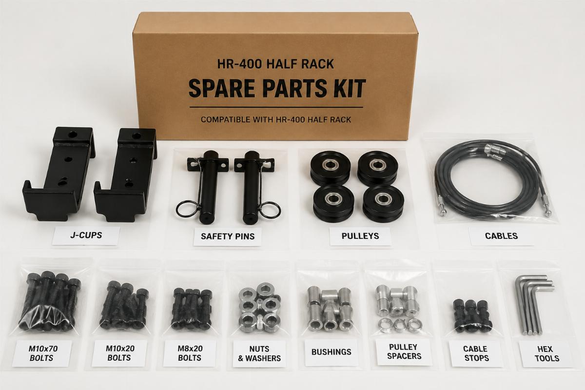 Spare parts kit for HR-400 Half Rack including J-cups, safety pins, pulleys, cables, and bushings organized in labeled packaging