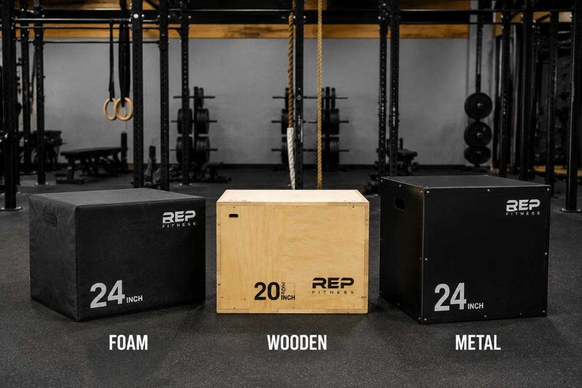 Three types of plyo boxes arranged side by side: foam, wooden, and metal, in a commercial gym setting